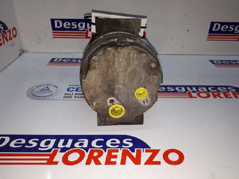 Recambio de compresor aire acondicionado para renault megane i fase 2 berlina (ba0) 1.9 d rt referencia OEM IAM 7700105765  